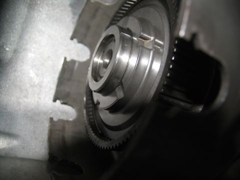 1978 Ford Bronco - A detailed view of a metal transmission part, likely from a vehicle's drivetrain.