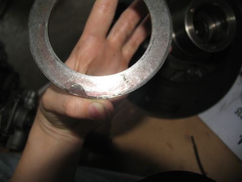 1978 Ford Bronco - A close-up shows a metal ring with '1 inch' stamped on its surface, held by a hand.