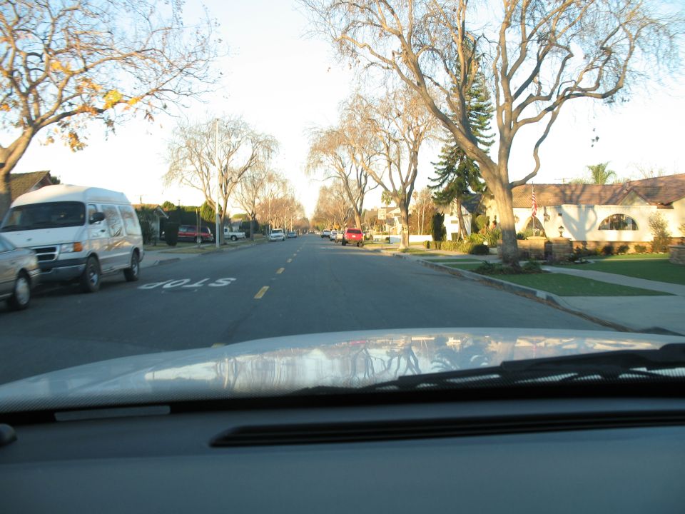 White van parked on residential street