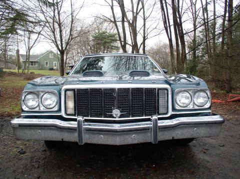 1973 Ford Ranchero - Front view of a 1974 Ford Ranchero showing its distinctive grille and hood scoops.