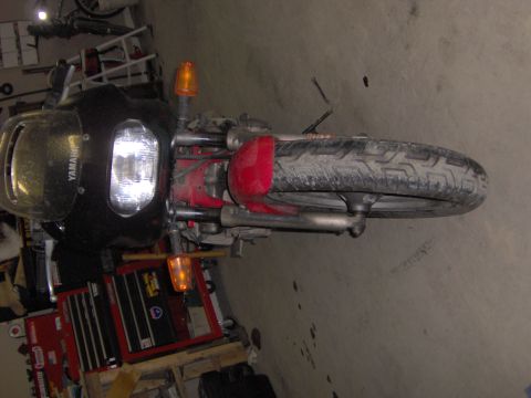 1993 Yamaha Seca II - A motorcycle is parked in a garage, with a Yamaha logo visible on the front fairing.