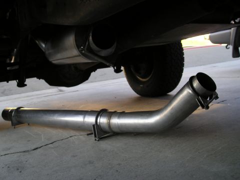 1997 Ford F-250 - Aftermarket exhaust pipe removed from a vehicle.