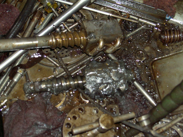 Worm gear and steering linkage with heavy grease and debris