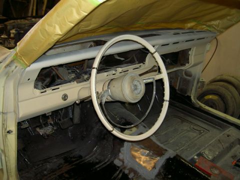 1967 Ford Ranchero - Interior view of a car undergoing restoration, with the dashboard and steering wheel visible.