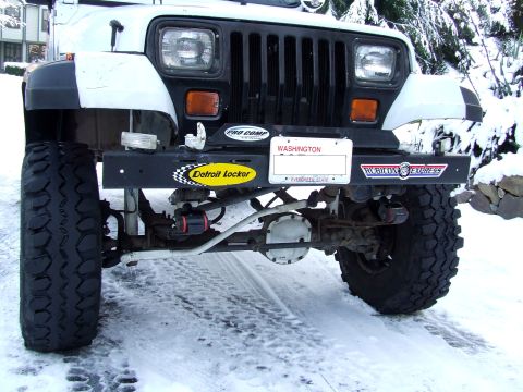 1991 Jeep Wrangler - This 1991 Jeep Wrangler is equipped with off-road tires and aftermarket suspension components.