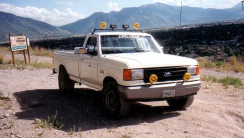 1991 Ford Bronco - This 1991 Ford F-150 pickup truck is equipped with decorative smiley face lights on the front and roof rack.