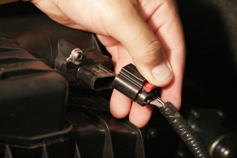 2005 Ford F-150 - To unlock the MAF sensor lead, press down on the red clip and pull straight out.
