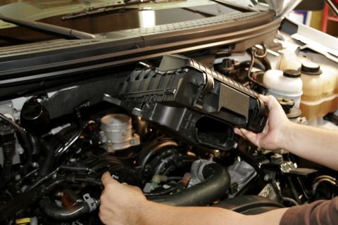 2005 Ford F-150 - With the bolts removed, the air box can be pulled away from the throttle body by hand, the MAF sensor is still inside so set it aside caref…