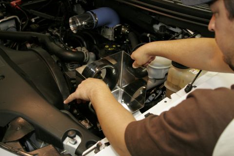 2005 Ford F-150 - The heat shield presses into two rubber grommets that must be installed in two existing holes in the truck. With the heat shield installed,…