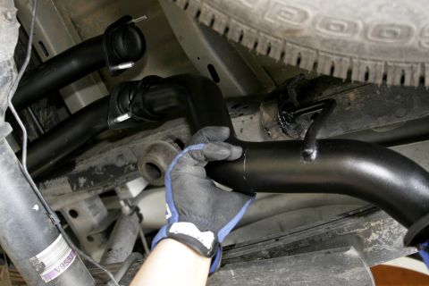2005 Ford F-150 - Hang the front exhaust outlet using the stock mount, then thread the nuts onto the studs by hand.