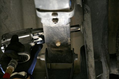 2005 Ford F-150 - The rear outlet needs a new mount attached to the frame, the bracket can bolt on here above the shackle mount or it can be welded on for a…