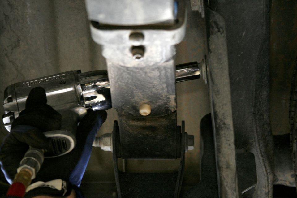 The rear outlet needs a new mount attached to the frame, the bracket can bolt on here above the shackle mount or it can be welded on for a stronger option.
