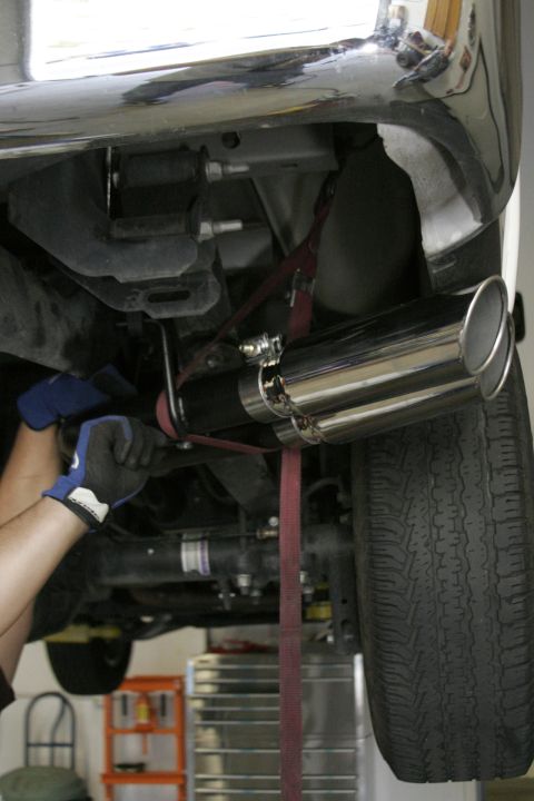 2005 Ford F-150 - With the pipes hung, bolt the two together and align the tips before tightening the whole system. A tie-down can support the outlet pipes t…