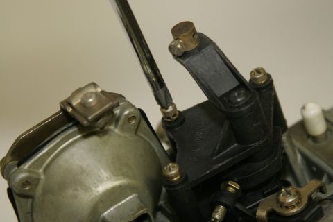 1967 Ford Mustang - This plastic choke unit is old and brittle, so we will be replacing it with a metal one form another Holley we had in the shop. This is a g…