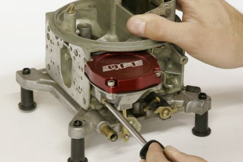 1967 Ford Mustang - The new QFT adjustable vacuum solenoid is held to the main body with the three original screws. This is a good place to start the reassembl…