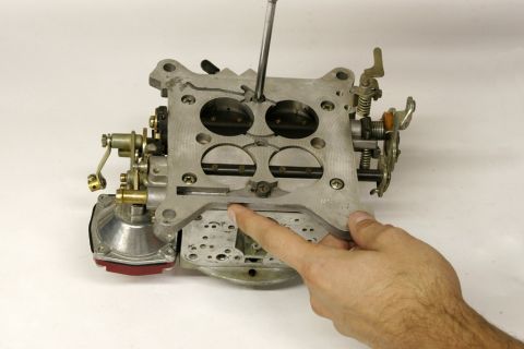 1967 Ford Mustang - An old throttle body gasket can cause vacuum leaks and tuning problems. To replace it, remove the throttle body, which is secured by these…