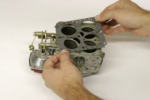 1967 Ford Mustang - Each rebuild kit contains gaskets for several sizes of carburetor, make sure to use the right size for the bores on your main body.
