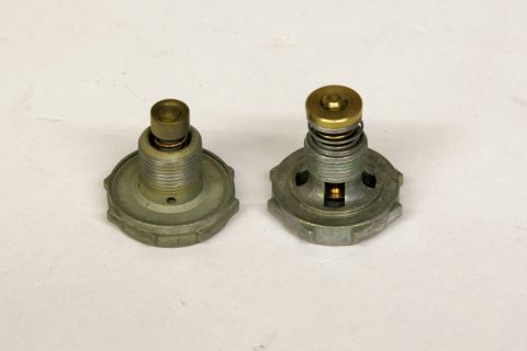 1967 Ford Mustang - Compared side-by-side, the original power valve can't begin to match the flow of QFT's Four Door power valve.