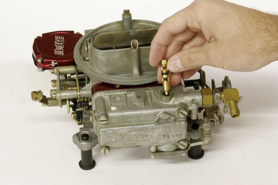 Install the new needle and seat assemblies by simply dropping them into the holes and pressing lightly with your finger to push the o-ring seals into place.