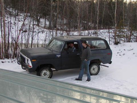 1979 Ford F-150 - A 1978 Ford Bronco sits in a snowy, wooded area with two occupants visible.