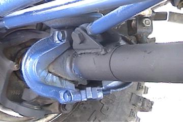 1991 Ford Bronco - Track bar mount and spacer to make the coil setup fit.