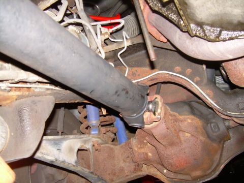 1988 Ford Bronco - Underside view of a 1988 Ford Bronco's driveshaft and differential assembly.