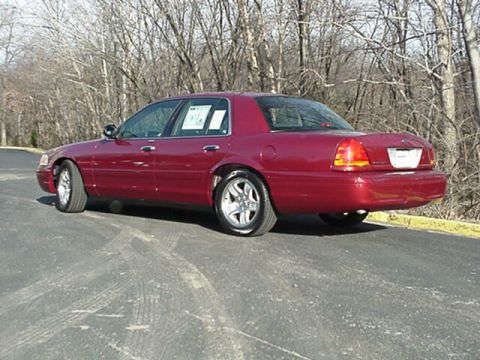2002 Ford Crown Victoria - This 2002 Ford Crown Victoria is shown from a 3q-front angle, highlighting its classic sedan body style.