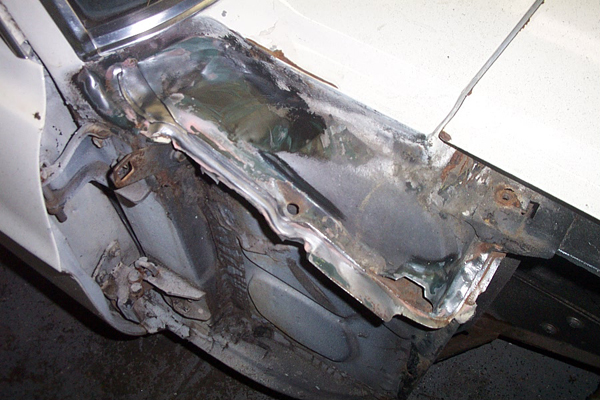 1968 Ford Mustang door jamb with rust and repair work