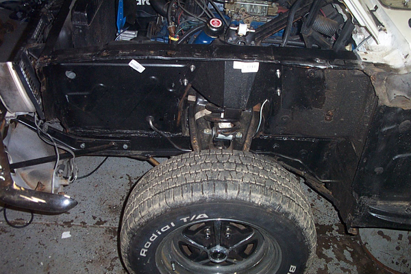 1968 Ford Mustang front wheel well and engine bay