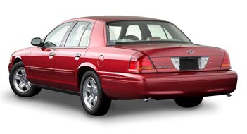 2002 Ford Crown Victoria - This 2002 Ford Crown Victoria is shown from the rear three-quarter angle.