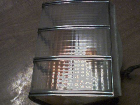 1973 Ford Ranchero - This is a close-up view of a vehicle's tail light assembly, showing its internal structure and clear lens.