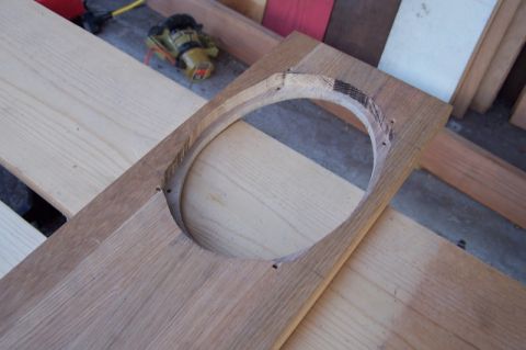 1990 Ford Bronco - A custom-cut wooden speaker adapter is shown, ready for installation.