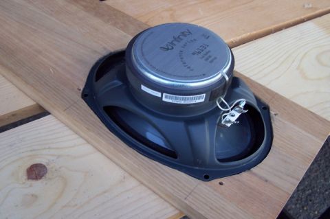 1990 Ford Bronco - An Infinity Reference Series speaker is installed in a wooden panel.