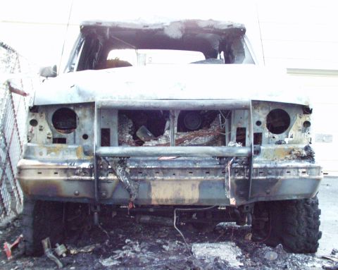 1989 Ford Bronco - This vehicle has sustained extensive fire damage, rendering it unrecognizable and inoperable.
