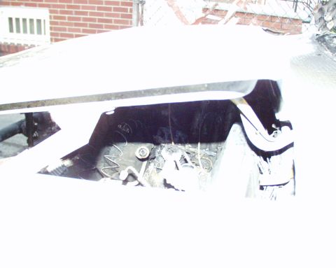 1989 Ford Bronco - The interior of a vehicle shows significant damage, suggesting it may have been involved in a fire.