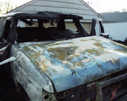 1989 Ford Bronco - This 1989 Ford Bronco suffered extensive fire damage, with the roof and hood severely burned.