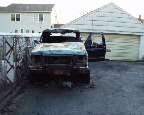 1989 Ford Bronco - This vehicle appears to have been involved in a fire, leaving it heavily damaged.