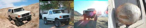 1988 Ford Bronco - A white Ford Bronco navigates a challenging off-road path with steep inclines and loose rocks.