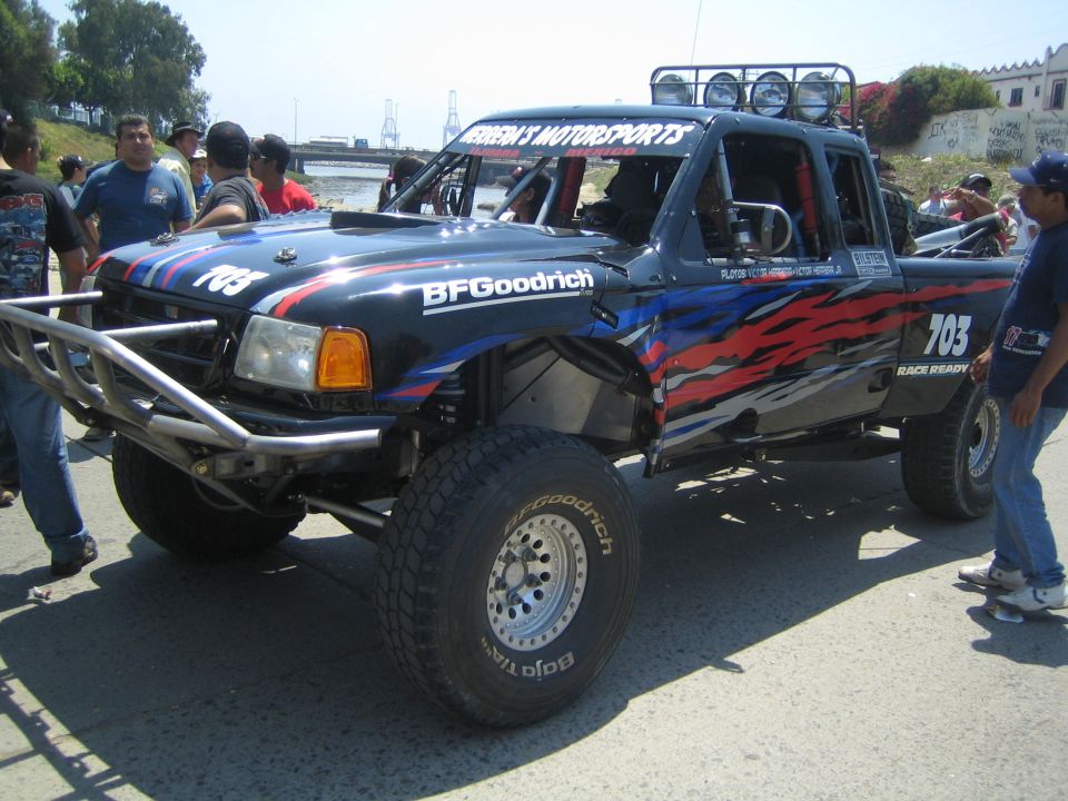 Black Ford Ranger prerunner race truck #703 with BFGoodrich tires and tube bumper