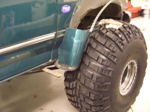 1996 Ford Bronco - Custom fender flare and oversized tire on a 1996 Ford Bronco.