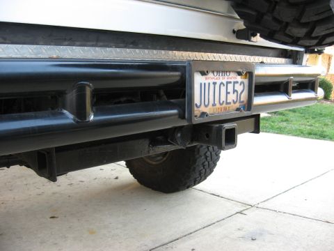 1996 Ford Bronco - The rear of a vehicle is shown, a custom bumper, trailer hitch, and an Ohio license plate.