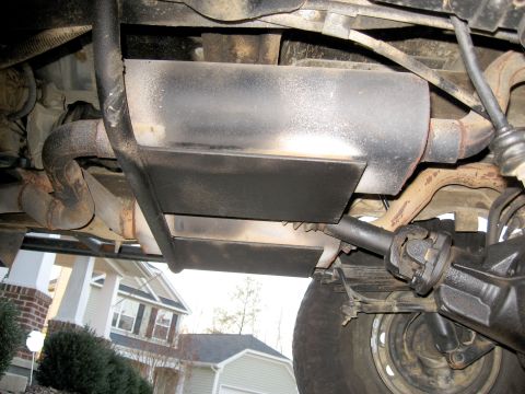 1996 Ford Bronco - Vehicle's exhaust system and driveshaft are visible from underneath.