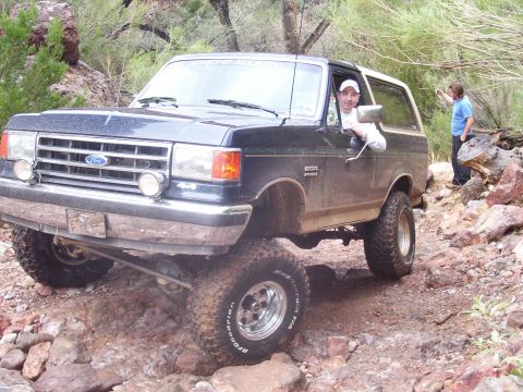 1991 Ford Bronco - This 1991 Ford Bronco is shown tackling a challenging off-road course.