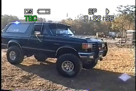 1989 Ford Bronco - This lifted 1989 Ford Bronco is shown in a three-quarter front view, appearing to be in an outdoor, possibly off-road setting.