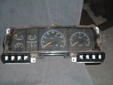 1989 Ford F-250 - Instrument cluster from a 1989 Ford F-250, showing various gauges and odometer reading.