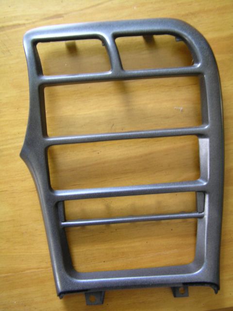 1993 Ford Probe - This is a car interior trim piece, possibly for a dashboard or center console.
