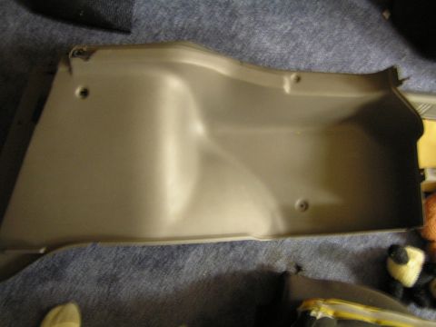 1993 Ford Probe - Interior trim panel for a vehicle, possibly from the trunk or cargo area.