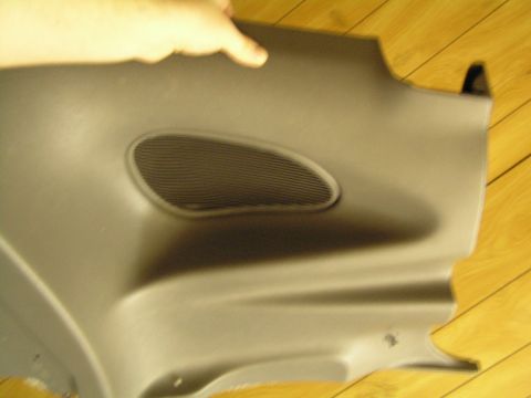 1993 Ford Probe - Car door panel with integrated speaker grille, likely from an interior trim piece.