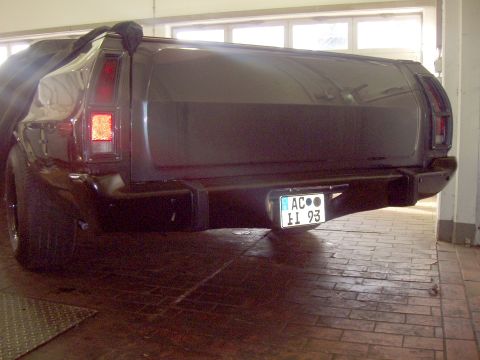 1972 Ford Ranchero - The rear of a 1972 Ford Ranchero is visible, with a license plate and part of the vehicle covered.
