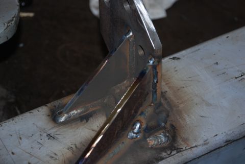 1996 Ford Bronco - Close-up view of a metal bracket assembly, showing the results of welding work.